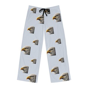 May include: Light blue pajama pants with a repeating pattern of bald eagle heads.