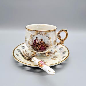 Preuss Porz collector&#39;s cup, coffee cup, coffee set, collector&#39;s set with dessert fork
