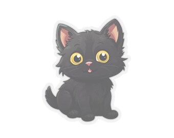 May include: A black kitten with big yellow eyes and a pink nose sits with its tail curled around its legs.