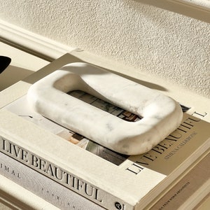 Decorative ornament made of marble in white
