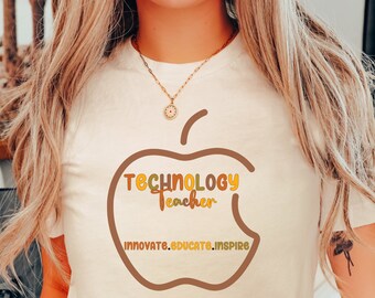 May include: A white t-shirt with a brown apple graphic that says "Technology Teacher" and "Innovate. Educate. Inspire." in a yellow, orange, and brown font.