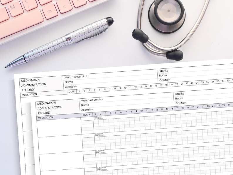May include: A medical setting still life featuring a stethoscope, a silver pen, a pink keyboard, and two medication administration record sheets. The sheets have sections for medication, allergies, and hourly records.
