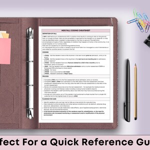 May include: A brown leather binder with a white MDS Fall Coding Cheatsheet. The binder contains pink sticky notes and a silver pen. A black pen and pencil are on the right. The text at the bottom says "Perfect For a Quick Reference Guide."