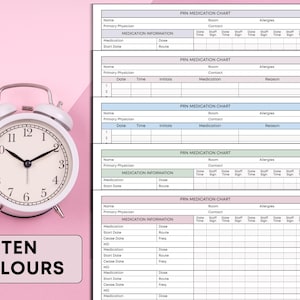 May include: A white alarm clock with black hands and numbers sits next to a stack of medication charts. The charts are labeled "PRN Medication Chart" and have spaces for patient information and medication details. The image also includes the text "TEN COLOURS".