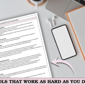 May include: A workspace setup with a document titled "Occupational Therapy Documentation Phrase Bank," a smartphone, a notepad, and wireless earbuds. The document includes text about depression, cognitive status, and intervention implementation. The phrase "TOOLS THAT WORK AS HARD AS YOU DO!!!" is at the bottom.