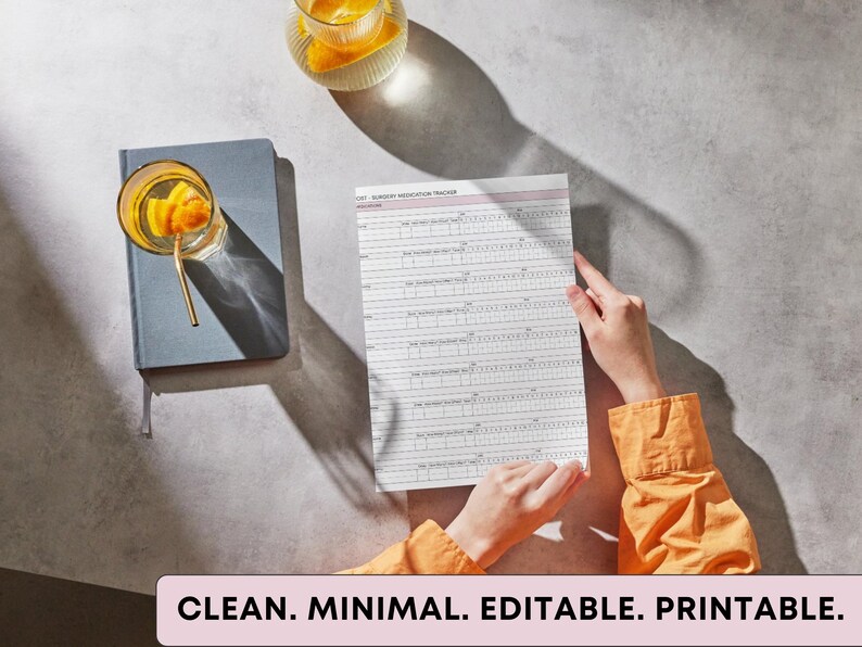 May include: A medication tracker with a pink header is held by a person wearing an orange shirt. A blue notebook and a glass of orange-infused water sit nearby. The text "CLEAN. MINIMAL. EDITABLE. PRINTABLE." is at the bottom.