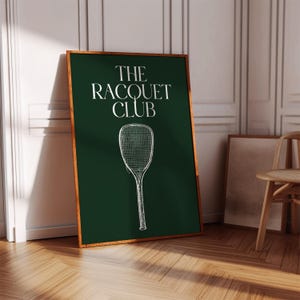 May include: A green poster with a white tennis racket and the text "THE RACQUET CLUB" in white.