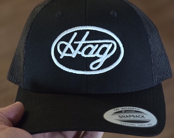 Merle Haggard "Hag" Embroidered Yupoong Trucker Hat