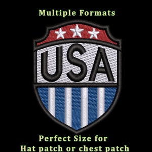 May include: A red, white, and blue embroidered patch with the word "USA" in black lettering and three white stars above the word. The patch is shaped like a shield with a blue and white striped border.