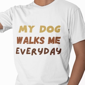 Funny Dog Shirt Unisex | "My Dog Walks Me Everyday" Tee | Dog Lover Gift | Pet Owner T-Shirt | Cute Dog Walking Shirt | Dog Mom Dad Tee