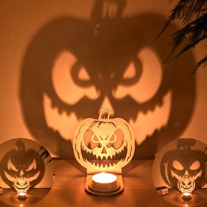 Dekoracja na Halloween z podgrzewaczem, upiorna dynia, latarnia, dekoracja na imprezę halloweenową, cień świecy, upiorny sezon, światło, przerażający duch, dynia