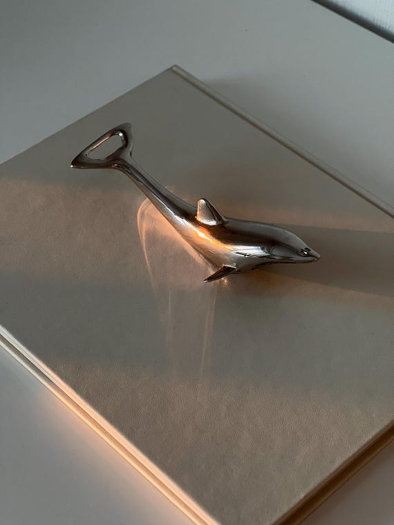 Vintage Metal Dolphin-Shaped Bottle Opener