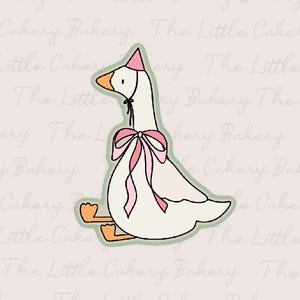 Peut inclure: Illustration d'une oie de dessin animé portant un chapeau de fête et un nœud rose. L'oie est de couleur crème avec des pieds et un bec orange, soulignés en noir. L'image a une bordure vert clair et est sur fond vert pâle.