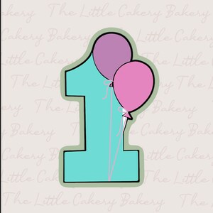 May include: A turquoise blue number one cookie cutter with two balloons attached. The balloons are purple and pink.