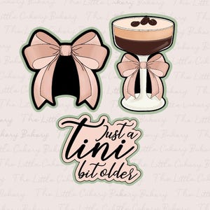 May include: Three pink and black cookie cutters. One is a bow, another is a cocktail with a bow, and the third says "Just a tini bit older". The image has a light pink background.