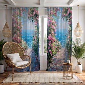 May include: A pair of floor-length window curtains featuring a printed landscape scene of a stone path lined with vibrant pink rose bushes leading toward a bright blue ocean under a clear sky, creating a scenic view across the window panels.