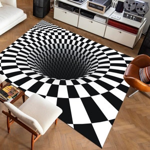 May include: A black and white chequered rug with a large, black hole in the centre, creating an optical illusion of a swirling vortex. The rug is on a wooden floor.