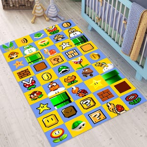 May include: A rectangular area rug featuring a colorful pixelated design inspired by a classic video game. The rug has a blue and yellow checkered pattern with various game characters and icons. The rug is on a light wood floor.
