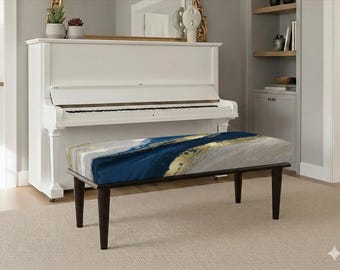 Banco abstracto moderno en azul marino y dorado, otomana tapizada de lujo, asiento de entrada con efecto mármol azul, elegante decoración de banco de piano