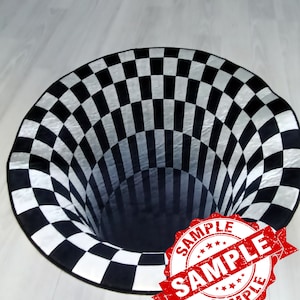 May include: A black and white checkered rug with a 3D optical illusion of a hole in the center. The rug is on a light wood floor. The word "SAMPLE" is stamped in red on the rug.