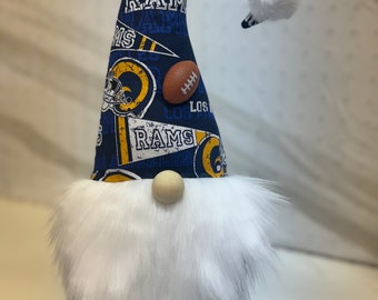 LA Rams football gnome stands 15”. This would be a fun addition to your gnome sports collection! Score this today!