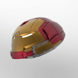 Puede incluir: Un casco dorado y rojo con acabado metálico. El casco tiene una forma redondeada y presenta un diseño en relieve en la parte delantera.