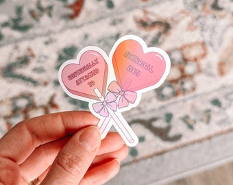 Emotionally Attached To Fictional Men Heart Lollipop Holographic Sticker