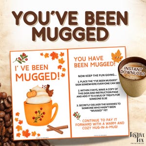 May include: A printable sign with the text "You've Been Mugged!" and instructions for a fun game. The sign features a cartoon mug with whipped cream, a pumpkin, and fall leaves. The text "I've Been Mugged!" is on the left side of the sign, and the instructions are on the right side. The sign is designed for a fall-themed party or event.