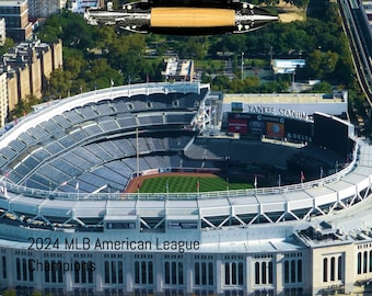 May include: An aerial view of Yankee Stadium, home of the New York Yankees, with the words "2024 MLB American League Champions" displayed on the front of the stadium.
