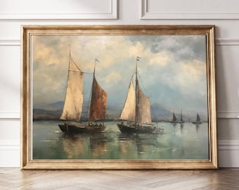 May include: A framed oil painting depicts sailboats on a calm sea under a cloudy sky. The boats have tan and brown sails. The painting is in a gold-colored frame and is displayed against a white wall.