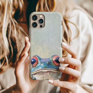 Whimsical Frog Art-telefoonhoesje – kleurrijk amfibieschilderij voor iPhone, Samsung, Google Pixel – levendige kikkerogen, op de natuur geïnspireerd hoesje