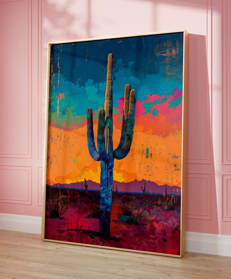 May include: A colorful abstract painting of a tall cactus in a desert landscape. The cactus is blue and green, and the background is a mix of orange, pink, and purple.