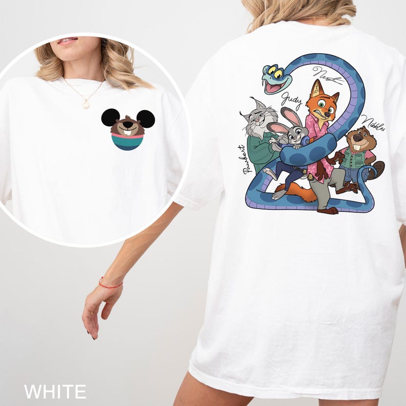 May include: White t-shirt featuring a cartoon graphic on the front and back. The front graphic is a Mickey Mouse-inspired character. The back graphic features cartoon characters and the text "Judy", "Nick", and "Nibbles".