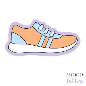May include: A sticker of a light blue and orange sneaker with white laces. The sticker has a purple outline and is on a white background. The text "Brighton Cutters" is below the sticker.