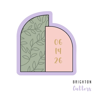 May include: A light purple and pink cookie cutter shaped like a half-circle with a leafy pattern on one side and the numbers 06, 14, and 26 on the other side. The text "Brighton Cutters" is printed below the cookie cutter.