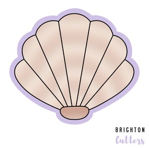 May include: A light purple and beige seashell cookie cutter with a black outline.  The cookie cutter is shaped like a seashell with a rounded top and a pointed bottom.  The text "Brighton Cutters" is printed in purple at the bottom of the image.