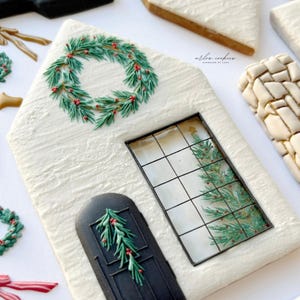 Gingerbread House decorated by Arlos Cookies