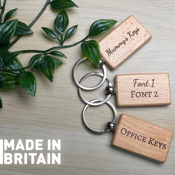 Personalised engraved solid wooden key rings.