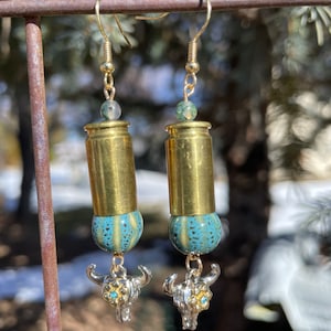 9mm bullet ammo shell gold brass dangle earrings with turquoise beads and cow skull with flower. Cowgirl 2A western earrings