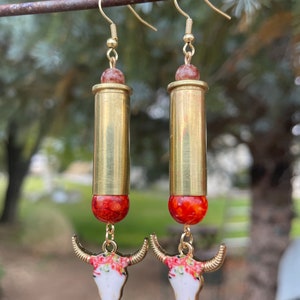 38 special bullet ammo shell gold brass dangle earrings with floral cow skull and beads. Cowgirl 2A western earrings