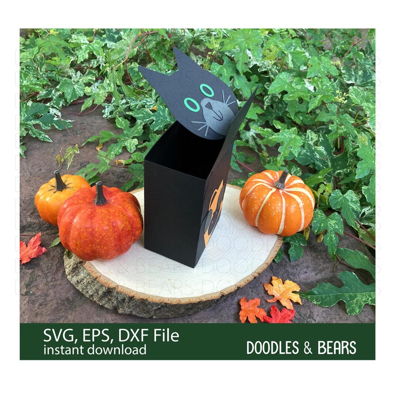 Halloween Black Cat Favor Treat Box - Cute black cat with green eyes holding an orange bag with jack-o-lantern for trick-or-treating is also a box for holding treats or favors. Digital download SVG file for use with Cricut or Silhouette machines.