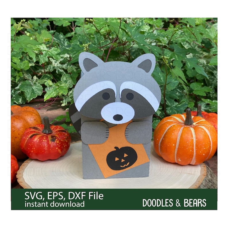 Halloween Raccoon Favor Treat Box - This Favor Treat Box has a cute gray raccoon with gray and white mask holding an orange bag with jack-o-lantern for trick-or-treating. Digital download SVG cut file for use with Cricut or Silhouette machines.