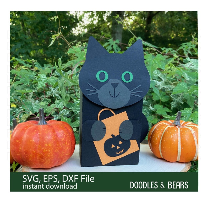 Halloween Black Cat Favor Treat Box - Cute black cat with green eyes holding an orange bag with jack-o-lantern for trick-or-treating is also a box for holding treats or favors. Digital download SVG file for use with Cricut or Silhouette machines.