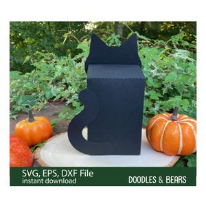 Halloween Black Cat Favor Treat Box - Cute black cat with green eyes holding an orange bag with jack-o-lantern for trick-or-treating is also a box for holding treats or favors. Digital download SVG file for use with Cricut or Silhouette machines.