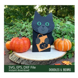 Halloween Black Cat Favor Treat Box - Cute black cat with green eyes holding an orange bag with jack-o-lantern for trick-or-treating is also a box for holding treats or favors. Digital download SVG file for use with Cricut or Silhouette machines.