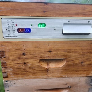 Solar beehive fan control humidity