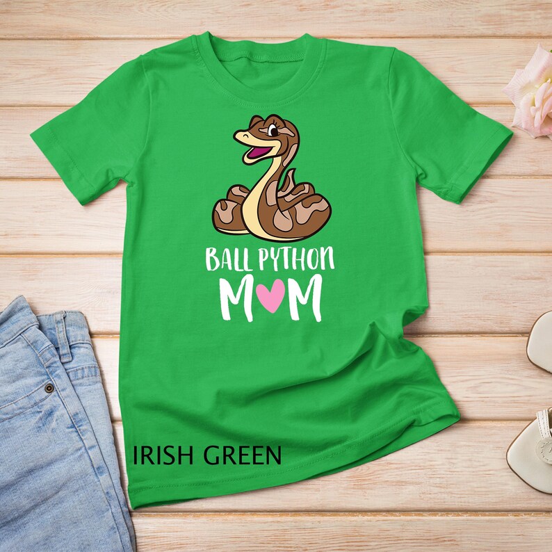 May include: A green t-shirt with a cartoon ball python and the text "Ball Python Mom" with a pink heart. The shirt is labeled "Irish Green".