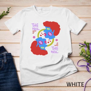 Camiseta sudadera con diseño divertido y caprichoso con caras de tonto de dibujos animados vibrantes