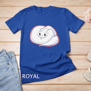 May include: A royal blue t-shirt featuring a white cartoon snake curled up on a pink background. The text "ROYAL" is printed on the bottom of the shirt.