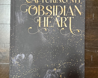 Capturing My Obsidian Heart Hardcover damaged